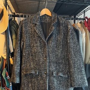 Wool blend herringbone tweed coat.